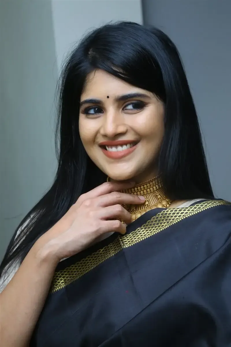 Megha Akash in Black Saree at Manu Charitra Telugu Movie Trailer Launch